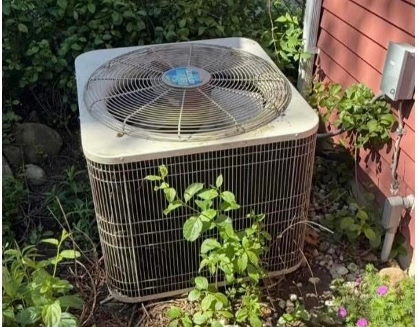 air conditioner before emergency repair at ypsilanti home 734-999-7310